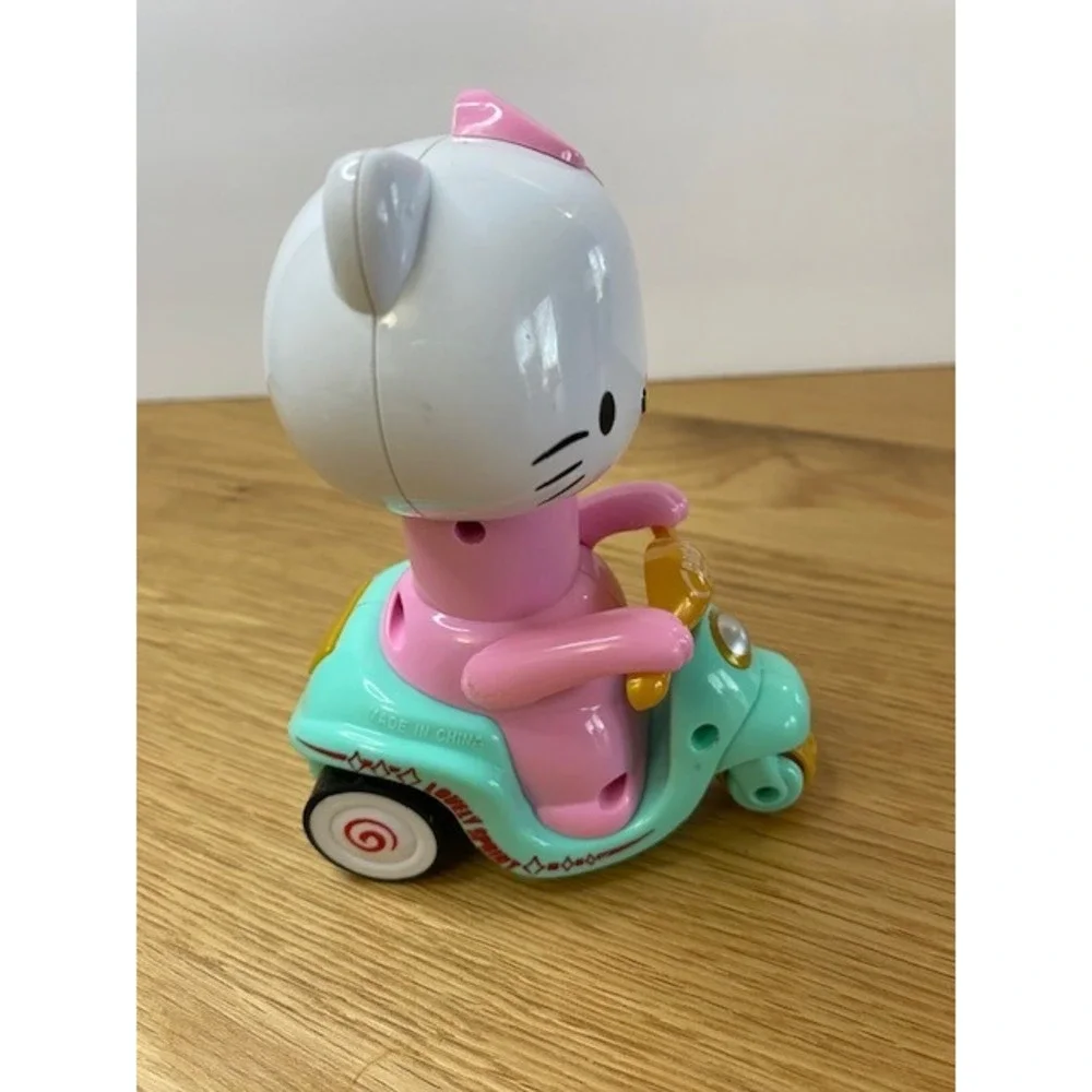 Hello Kitty Push Car‎ Scooter Kids OS Teal Pink Good Press Down Toy
